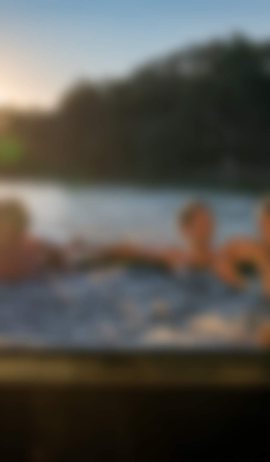 Resized Group of friends chilling in a hot tub on a houseboat
