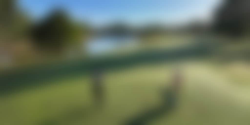 Couple playing golf at Rich River Golf Club