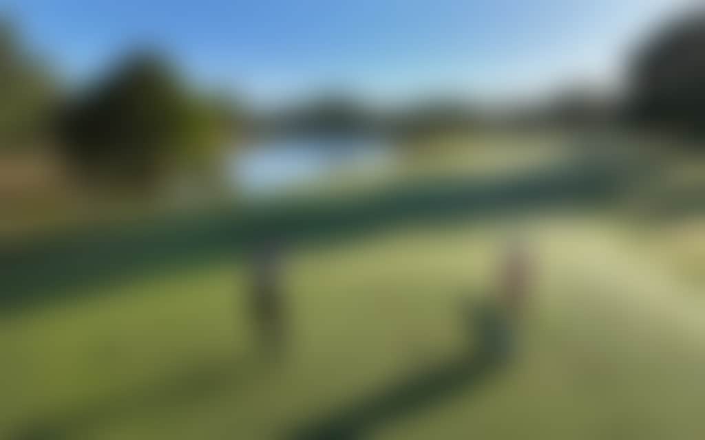 Couple playing golf at Rich River Golf Club