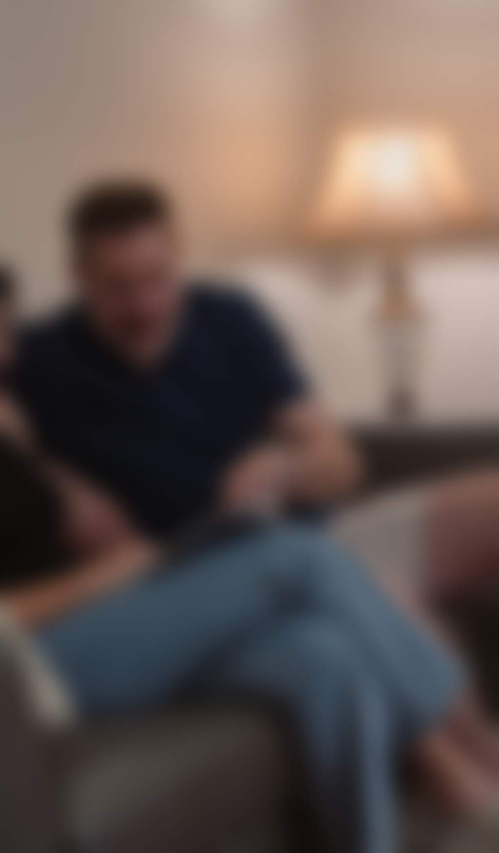 Resized Mature couple sitting on the couch in their charming air bnb