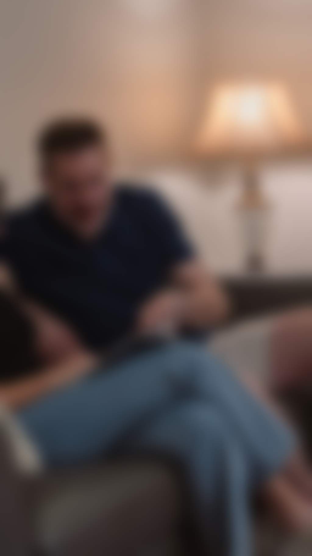 Resized Mature couple sitting on the couch in their charming air bnb