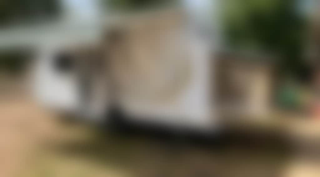 Allandi Caravan set up for camping during the summer months