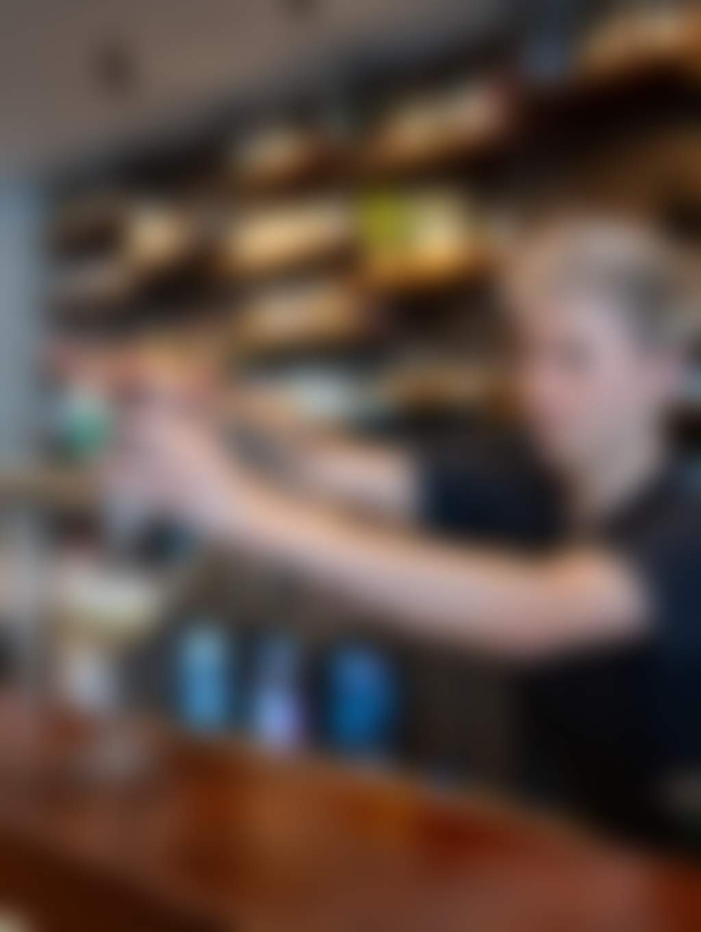 Bartender pouring cocktail at Bar Lee Distillery Echuca