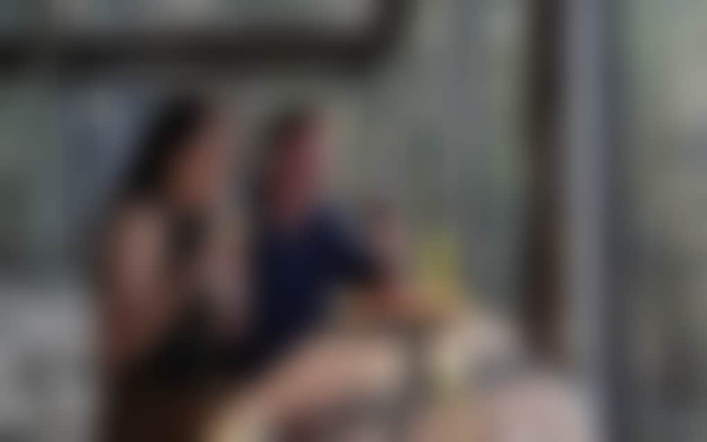 Resized mature couple drinking wine and eating cheese at a winery