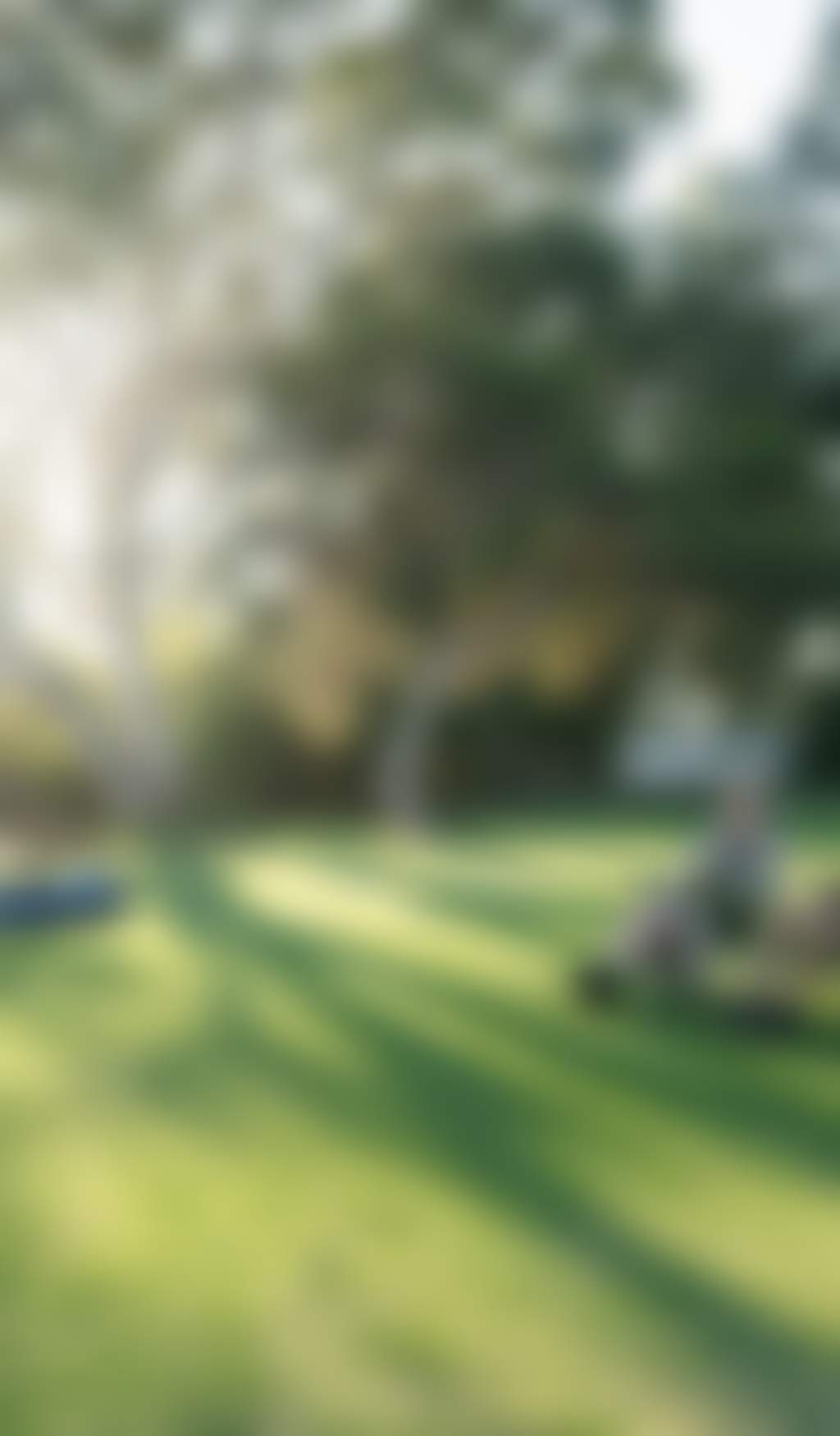 Resized Two women itting on camping chairs next to their car on the banks of the Murray River